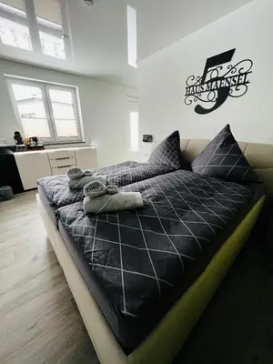 Ein Bett oder Betten in einem Zimmer der Unterkunft Haus Maensel