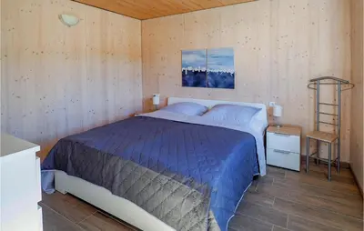 Ein Bett oder Betten in einem Zimmer der Unterkunft Ferienpark Wolfsschluchtht