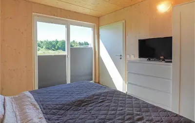 Ein Bett oder Betten in einem Zimmer der Unterkunft Ferienpark Wolfsschluchtht