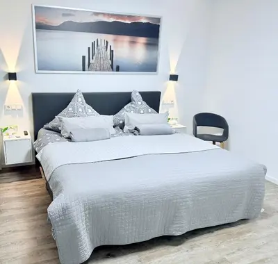 Ein Bett oder Betten in einem Zimmer der Unterkunft FeWo Mosel - Comfort & Relax