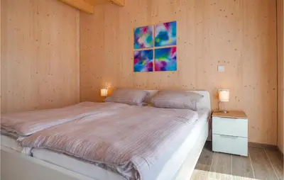 Ein Bett oder Betten in einem Zimmer der Unterkunft Ferienpark Wolfsschlucht