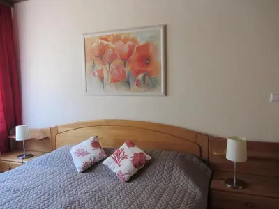 Ein Bett oder Betten in einem Zimmer der Unterkunft Ferienwohnung Roter Wingert