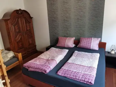 Ein Bett oder Betten in einem Zimmer der Unterkunft Ferienhaus Stahlbergblick