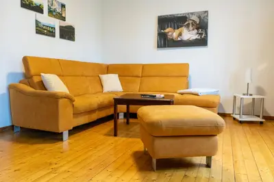 Ein Sitzbereich in der Unterkunft Ferienhaus Reuter