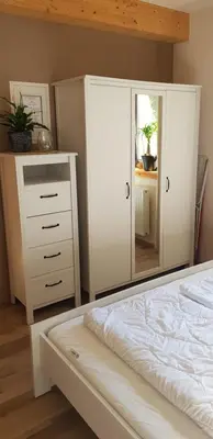 Ein Bett oder Betten in einem Zimmer der Unterkunft Neumühle Ferienwohnung 2