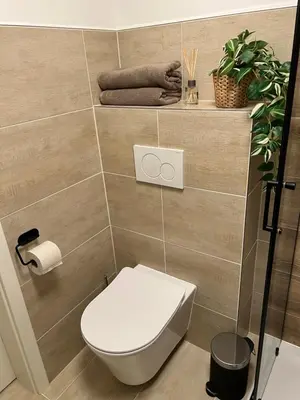 Ein Badezimmer in der Unterkunft TRIMOSA - Apartments & Homes