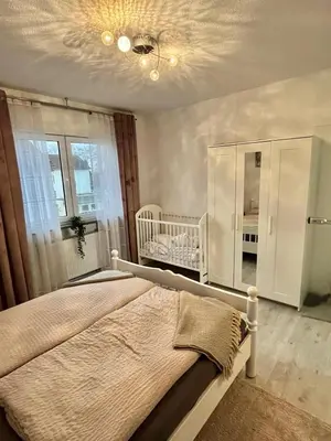 Ein Bett oder Betten in einem Zimmer der Unterkunft FeWo mit Terrasse Neuwied & Koblenz