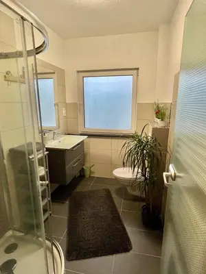 Ein Badezimmer in der Unterkunft FeWo mit Terrasse Neuwied & Koblenz