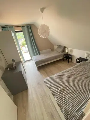 Ein Bett oder Betten in einem Zimmer der Unterkunft Relaxen am Waldesrand Fewo 2