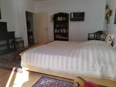 Ein Bett oder Betten in einem Zimmer der Unterkunft Literaturhaus Schmökermühle