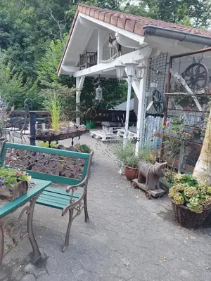 Ein Garten an der Unterkunft Literaturhaus Schmökermühle