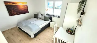Ein Bett oder Betten in einem Zimmer der Unterkunft Ring Apartment am Nürburgring