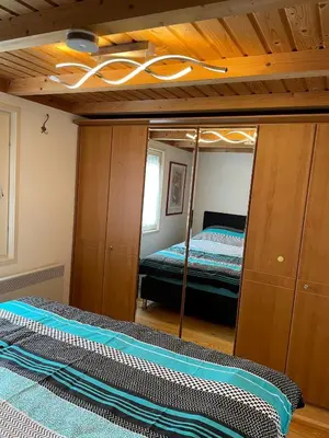 Ein Bett oder Betten in einem Zimmer der Unterkunft Majo