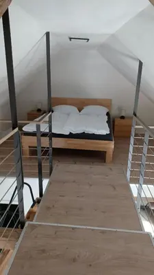 Ein Bett oder Betten in einem Zimmer der Unterkunft Meyer Holiday