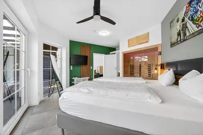 Ein Bett oder Betten in einem Zimmer der Unterkunft JUNIPRO Luxury Apartments
