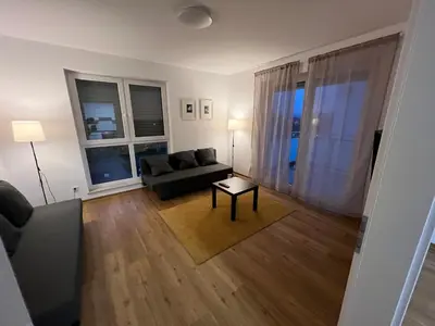 Ein Sitzbereich in der Unterkunft ApartHotel Roxheim