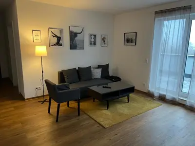 Ein Sitzbereich in der Unterkunft ApartHotel Roxheim