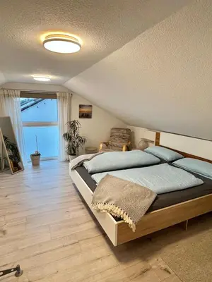 Ein Bett oder Betten in einem Zimmer der Unterkunft FeWo Neuwied & Koblenz