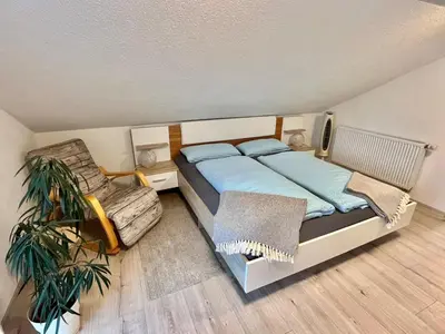 Ein Bett oder Betten in einem Zimmer der Unterkunft FeWo Neuwied & Koblenz