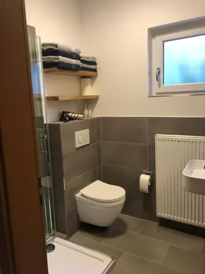 Ein Badezimmer in der Unterkunft Ferienwohnung am Pferdemarkt
