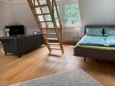 Ein Bett oder Betten in einem Zimmer der Unterkunft Ferienwohnung Moseltraum