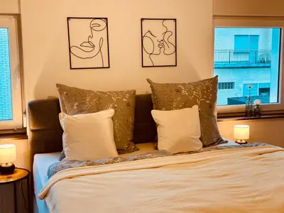 Ein Bett oder Betten in einem Zimmer der Unterkunft Ferienhaus Griede mit 3 Schlafzimmern