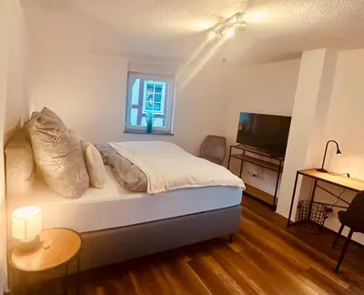 Ein Bett oder Betten in einem Zimmer der Unterkunft Ferienhaus Griede mit 3 Schlafzimmern