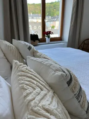 Ein Bett oder Betten in einem Zimmer der Unterkunft Wanderlust East73