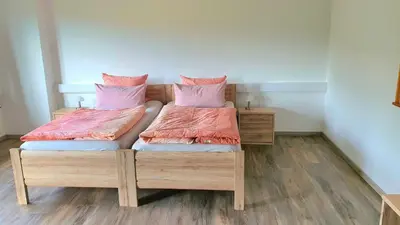 Ein Bett oder Betten in einem Zimmer der Unterkunft Ferienwohnung am Ring