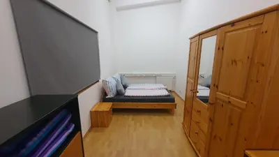 Ein Bett oder Betten in einem Zimmer der Unterkunft Ferienwohnung am Ring