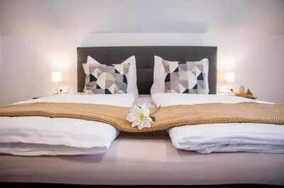 Ein Bett oder Betten in einem Zimmer der Unterkunft Weingut Erich Serwazi