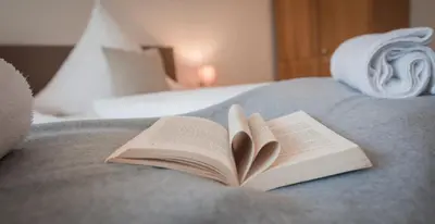Ein Bett oder Betten in einem Zimmer der Unterkunft Weingut Erich Serwazi