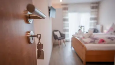 Ein Bett oder Betten in einem Zimmer der Unterkunft Weingut Erich Serwazi