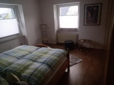 Ein Bett oder Betten in einem Zimmer der Unterkunft Fewo1926