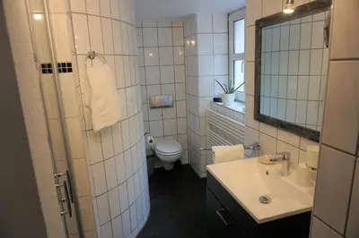 Ein Badezimmer in der Unterkunft Hotel Jan van Werth