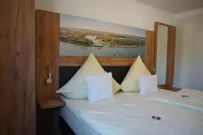 Ein Bett oder Betten in einem Zimmer der Unterkunft Hotel Jan van Werth