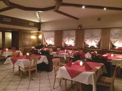 Ein Restaurant oder anderes Speiselokal in der Unterkunft Gasthof Zuck