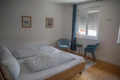 Ein Bett oder Betten in einem Zimmer der Unterkunft Vineyards Pommern - schönes Ferienhaus Nähe Cochem Mosel