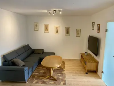 Ein Sitzbereich in der Unterkunft Ferienwohnung Brunnenblick