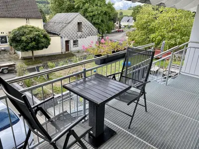 Ein Balkon oder eine Terrasse in der Unterkunft Ferienwohnung Brunnenblick