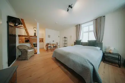 Ein Bett oder Betten in einem Zimmer der Unterkunft Residenz Moselliebe