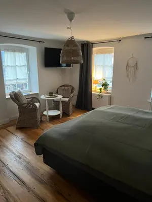 Ein Bett oder Betten in einem Zimmer der Unterkunft Residenz Moselliebe