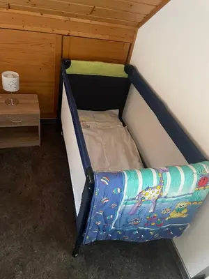 Ein Bett oder Betten in einem Zimmer der Unterkunft Ferienwohnung im schönen Brohltal