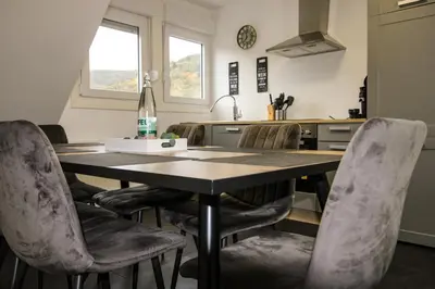 Ein Sitzbereich in der Unterkunft Sweet Six, Sauna, Balkon, 6 Personen, Boxspringbetten, hochwertiges Bad