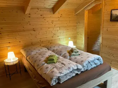 Ein Bett oder Betten in einem Zimmer der Unterkunft EifelGlückV