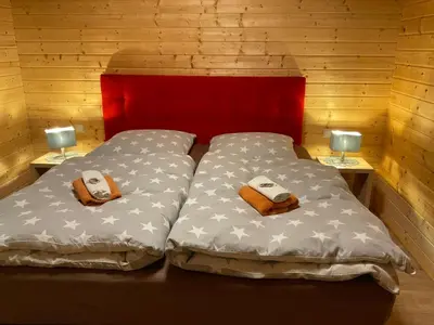 Ein Bett oder Betten in einem Zimmer der Unterkunft EifelGlückV