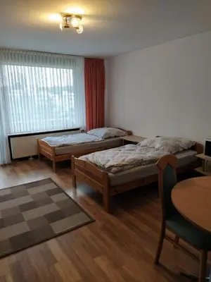 Ein Bett oder Betten in einem Zimmer der Unterkunft B606, Schönes Appartement in ruhiger Lager