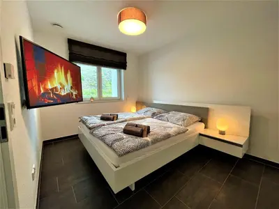 Ein Bett oder Betten in einem Zimmer der Unterkunft Villa Moselufer, Aussicht auf Burg Cochem und Mosel, Barrierefrei , Balkon