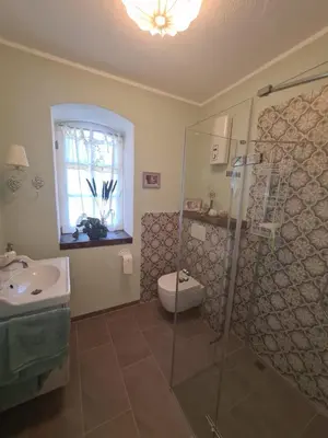 Ein Badezimmer in der Unterkunft Neue Ferienwohnung im alten Forsthaus