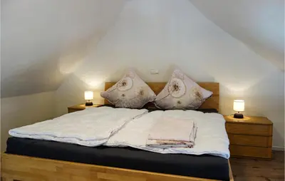 Ein Bett oder Betten in einem Zimmer der Unterkunft Beautiful Home In Heckenmünster